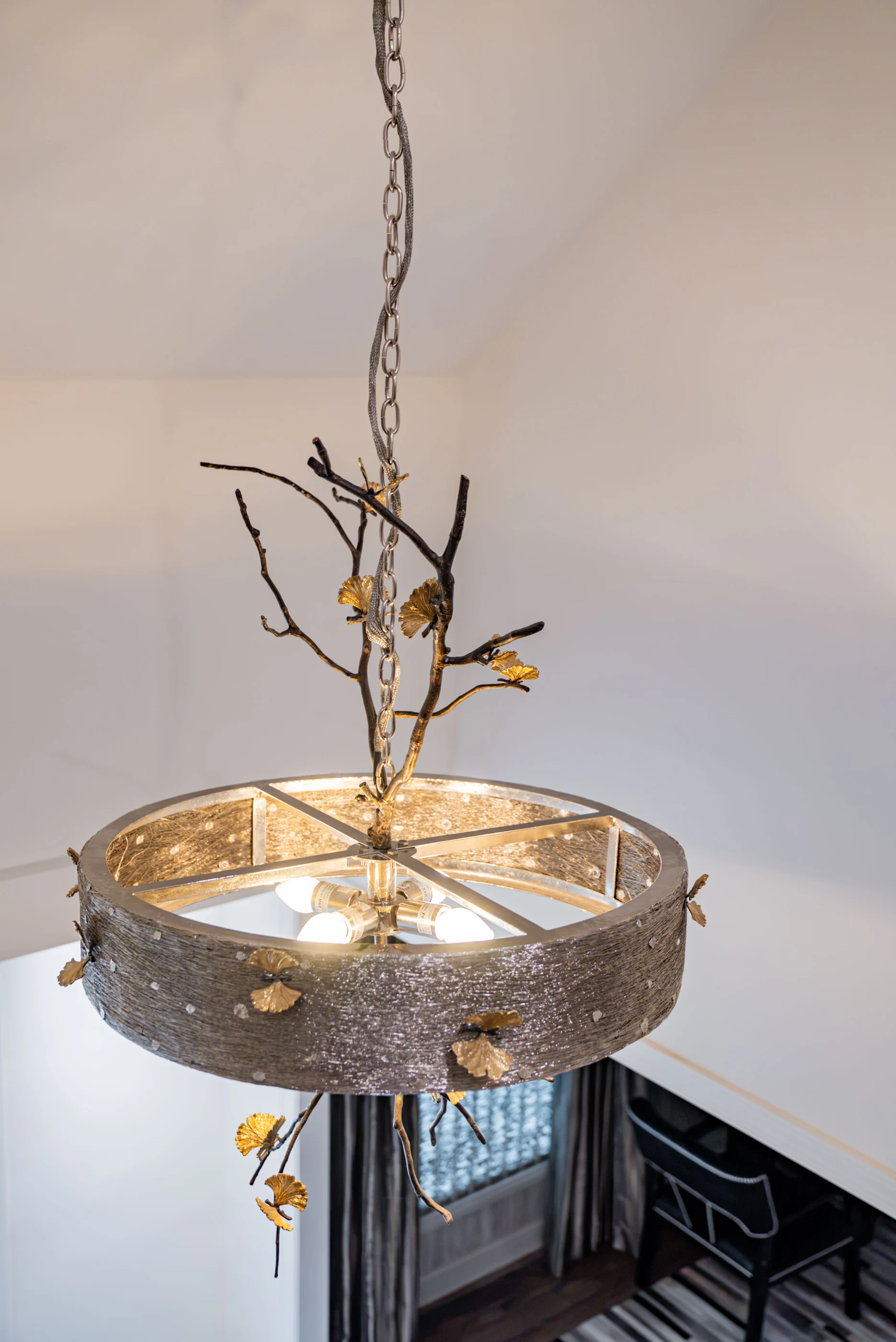 Sculptural chandelier above the stair at Hart Townhouse.