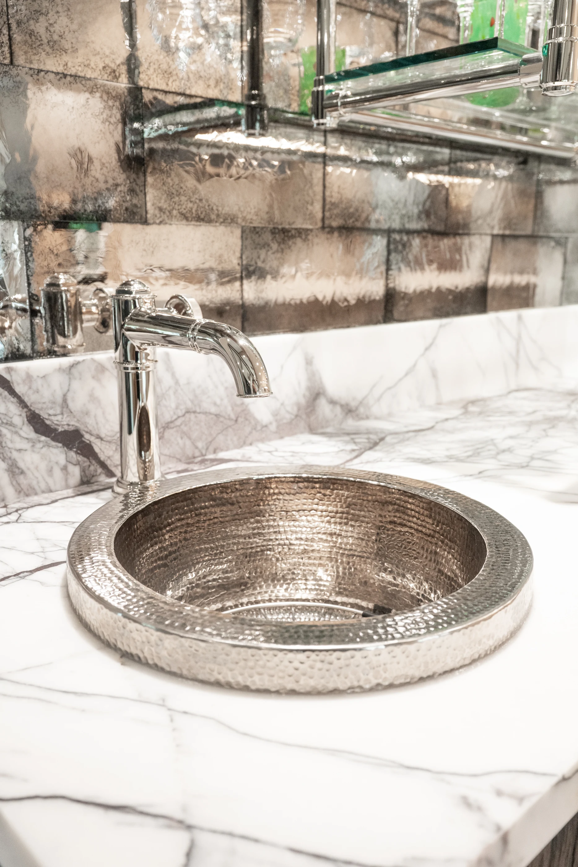 Hammered metal sink and polished bar fittings at Hart Townhouse.
