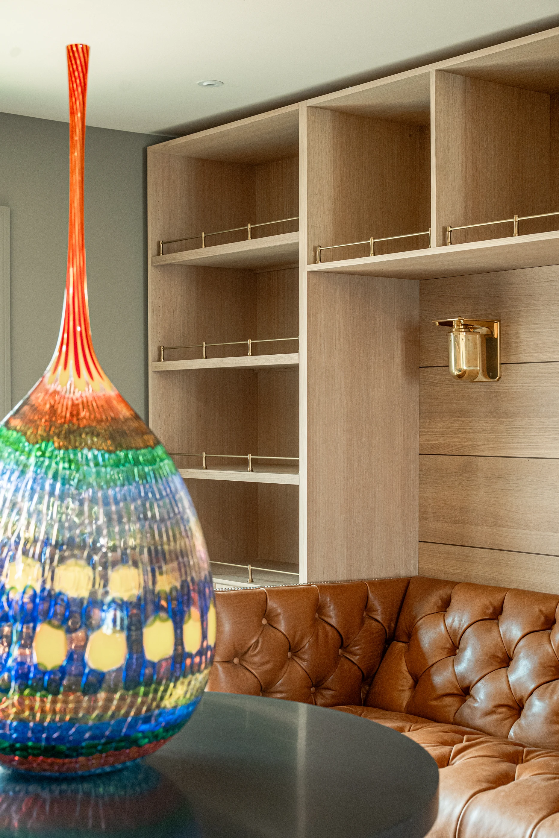 Colorful glass sculpture beside the leather banquette at Hart Townhouse.