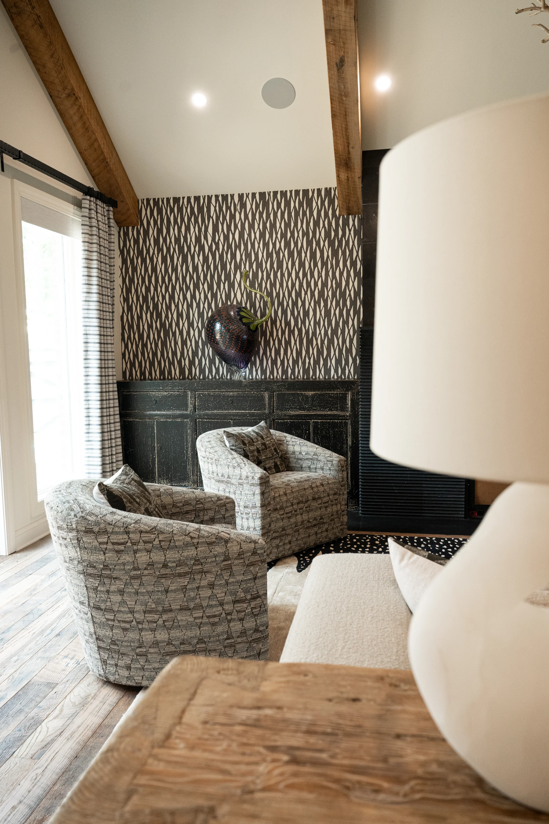 Seating and sculptural lamp in the living room at Hart Townhouse.