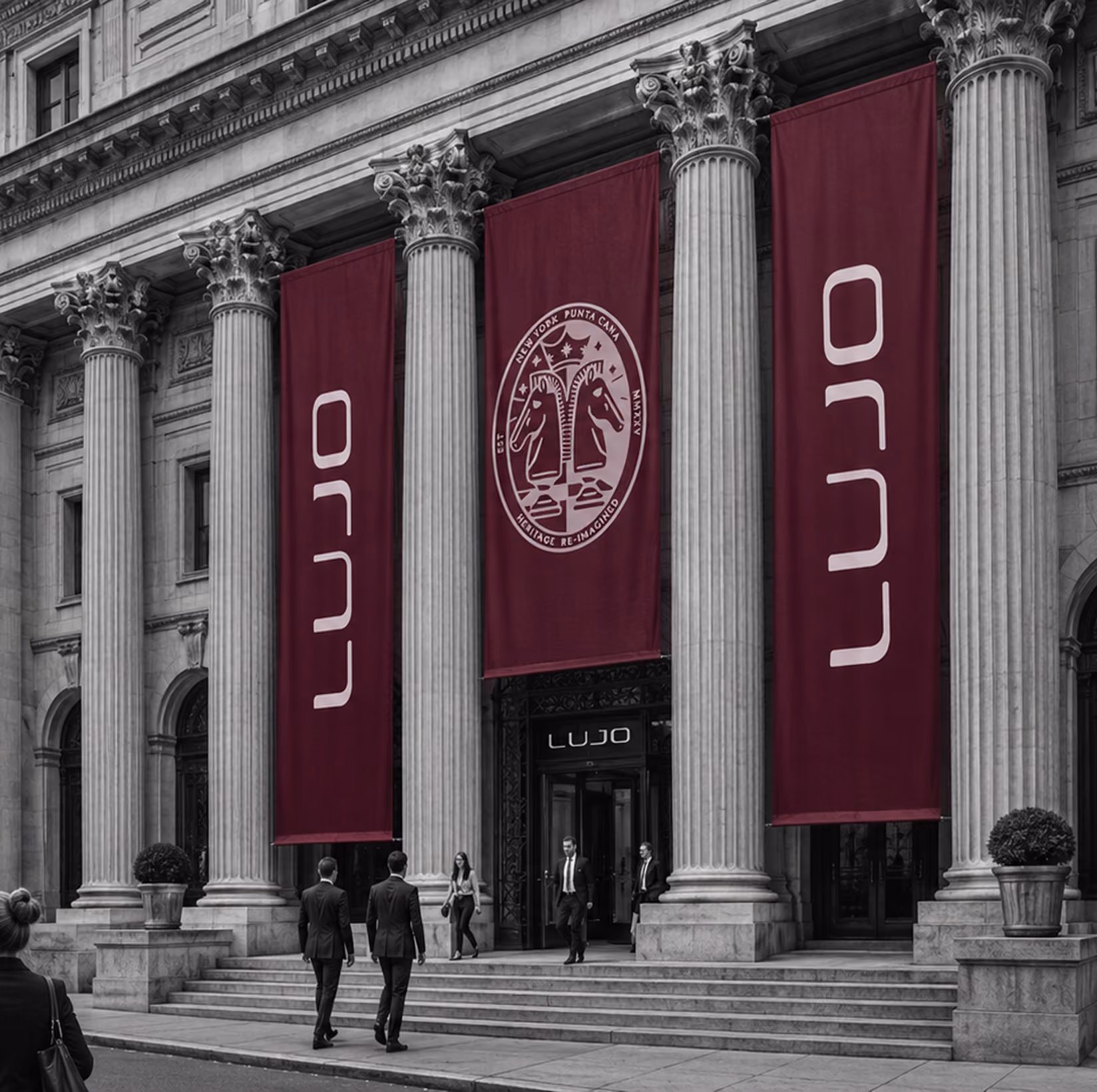 LUJO banners hanging between the columns of a neoclassical building
