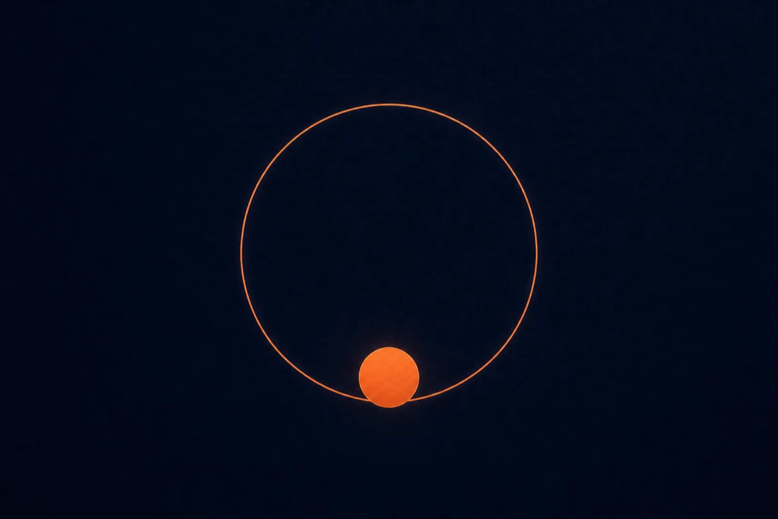 Thin concentric orange rings on deep navy
