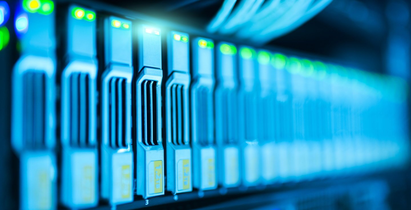 Data-centre infrastructure lit in EXA blue and orange