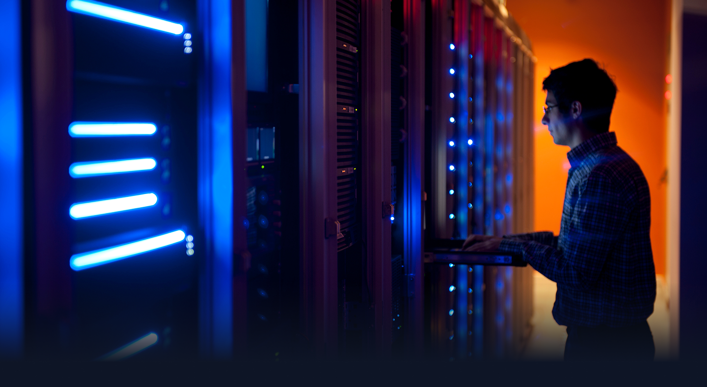 Data-centre infrastructure lit in EXA blue and orange