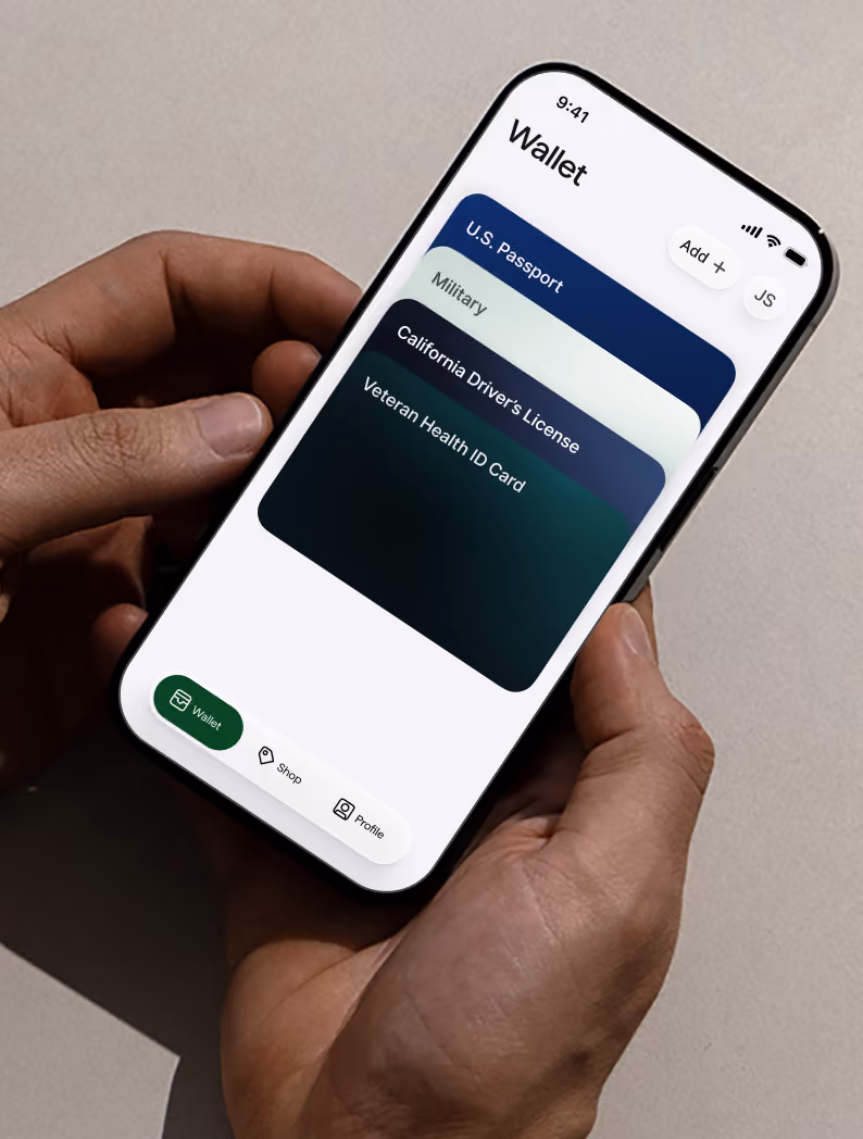 Hands holding a phone showing the ID.me wallet