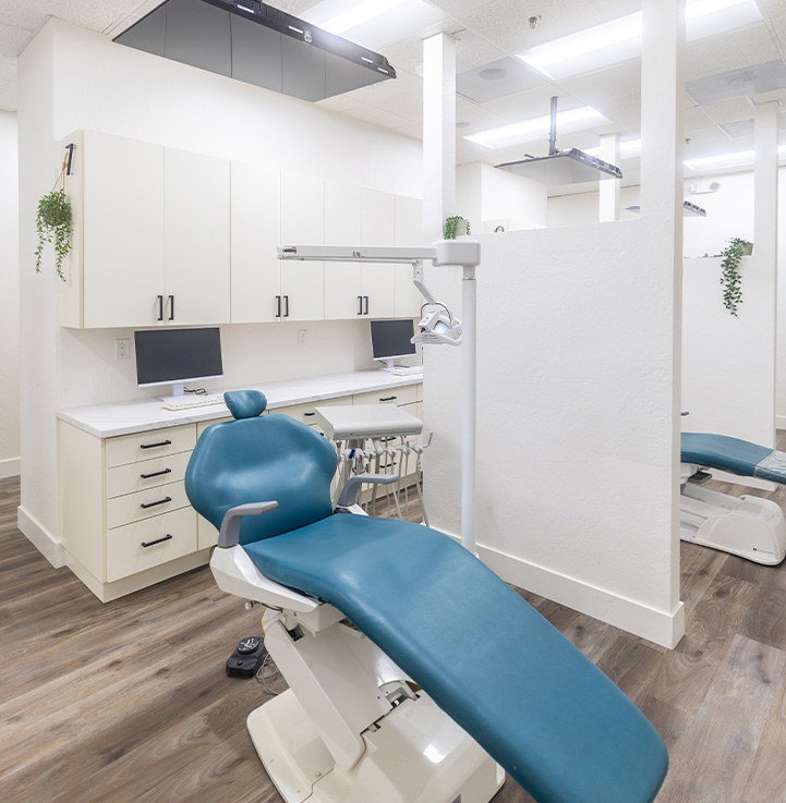 Modern dental treatment room with patient chair at Genuine Care Dental in Saratoga, CA
