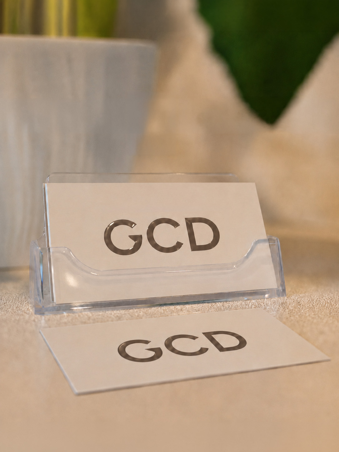 Genuine Care Dental business cards at the front desk of our Saratoga dental office
