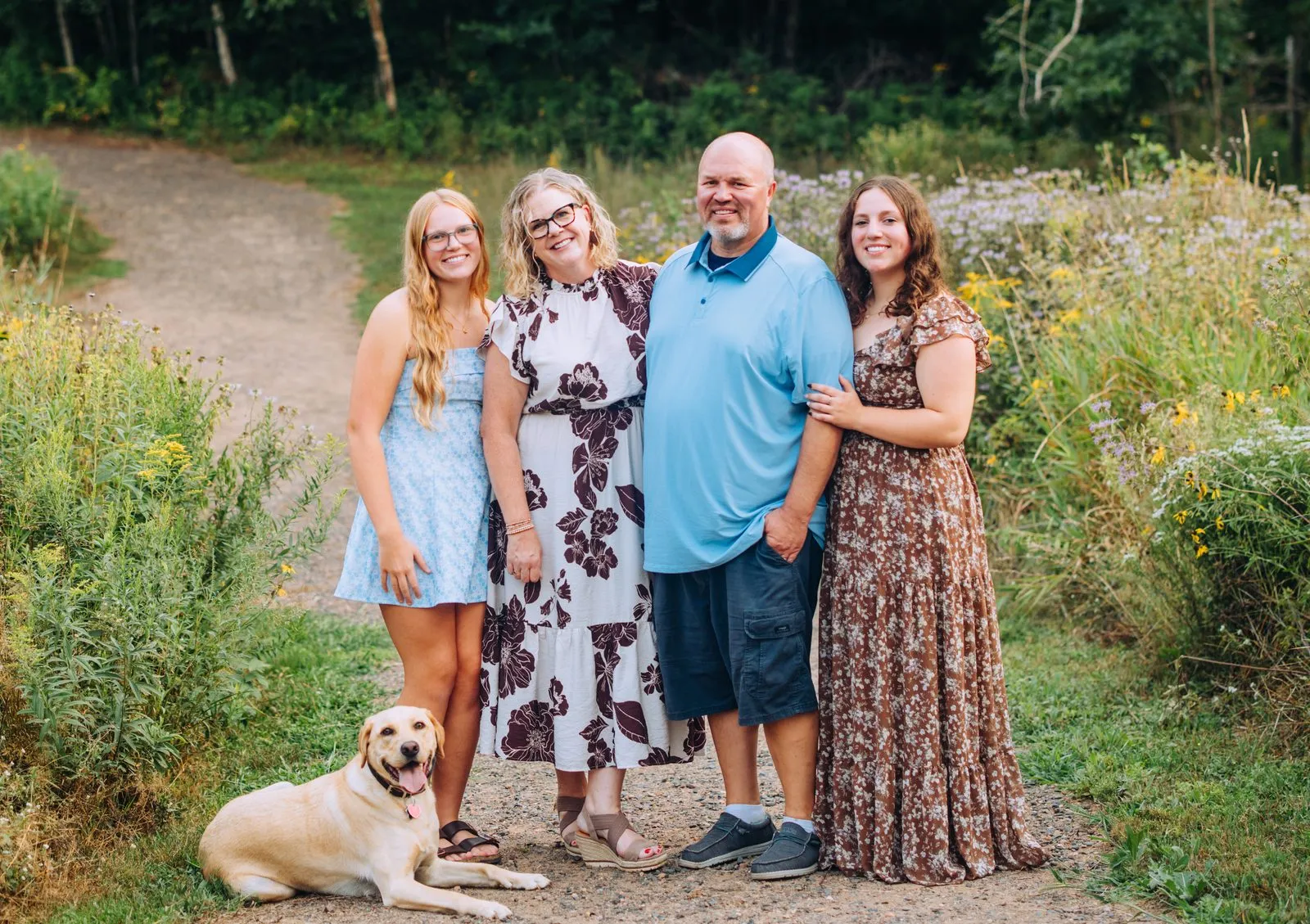 Dr. Jennifer Herbert with her family and dog Howie