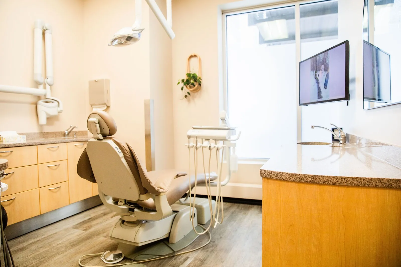 J & D Dental treatment room with dental chair