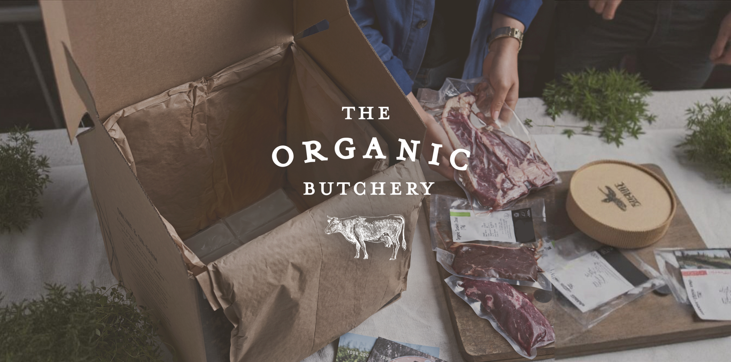 The Organic Butchery Shopify website shown on a laptop