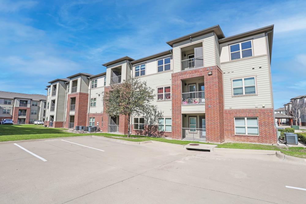 Exterior of property buildings and parking lot