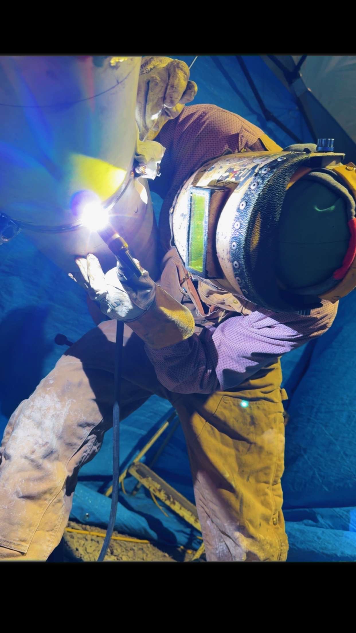 Tulsa Specialty Welding welder performing industrial pipe welding