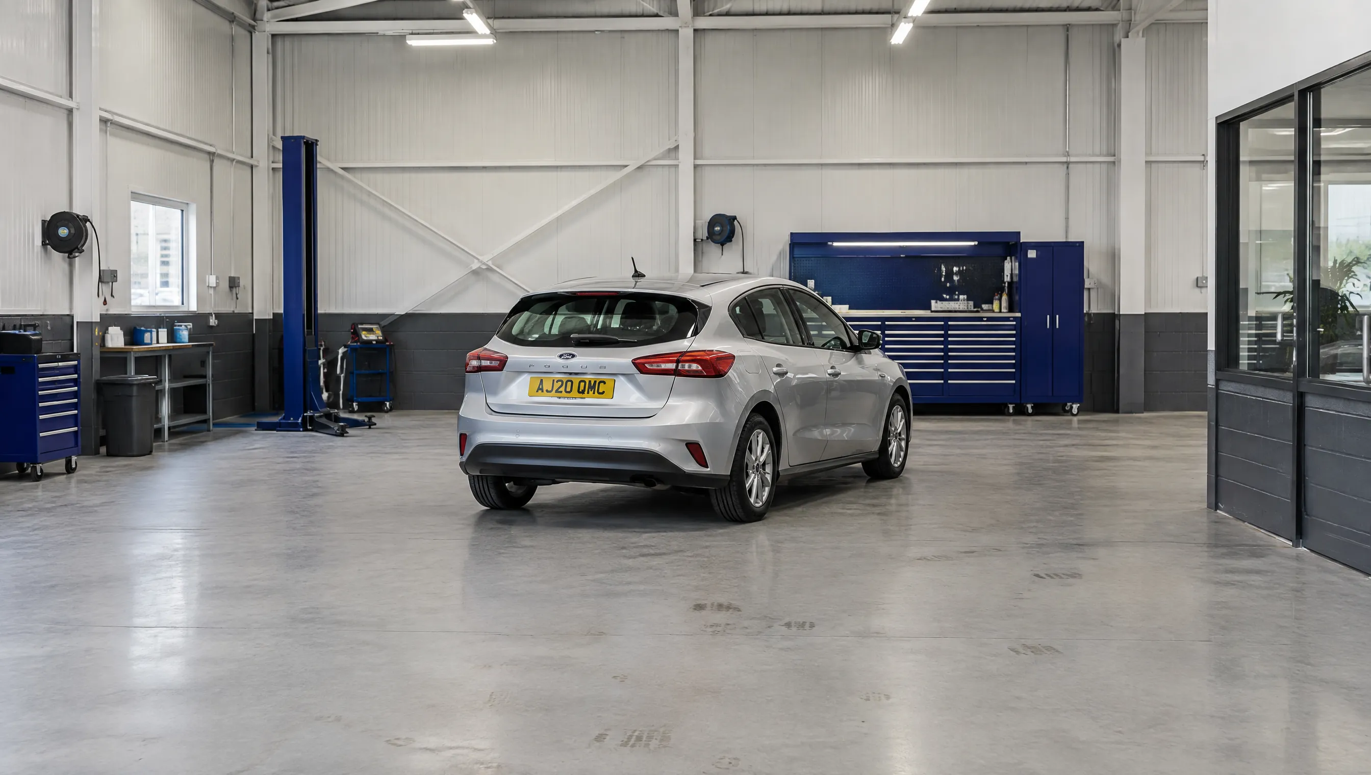 Illustrative image of a technician discussing vehicle inspection findings with a customer.