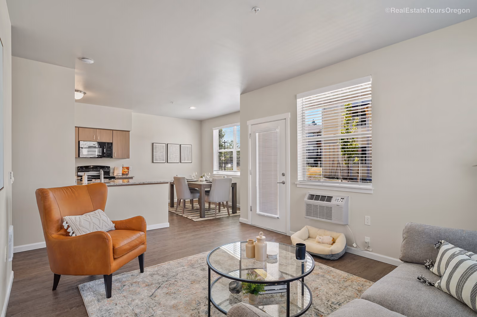 Living room with wood style floors at The Jory Apartments in Salem, Oregon