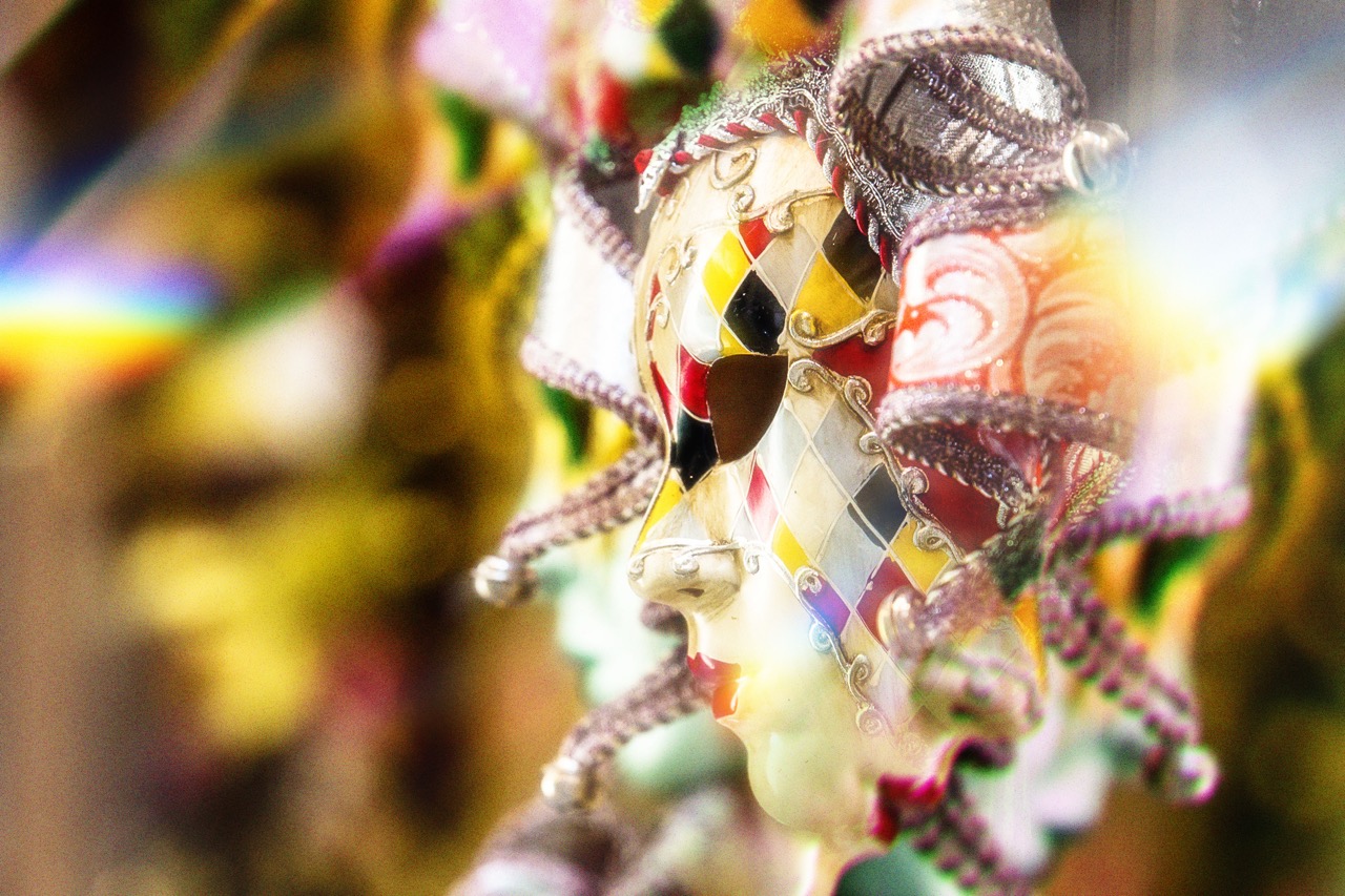 Colorful harlequin mask with small bells