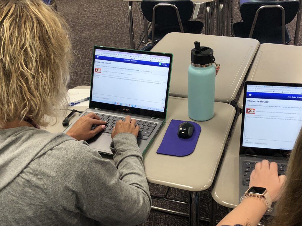 Teacher using Short Answer on a computer