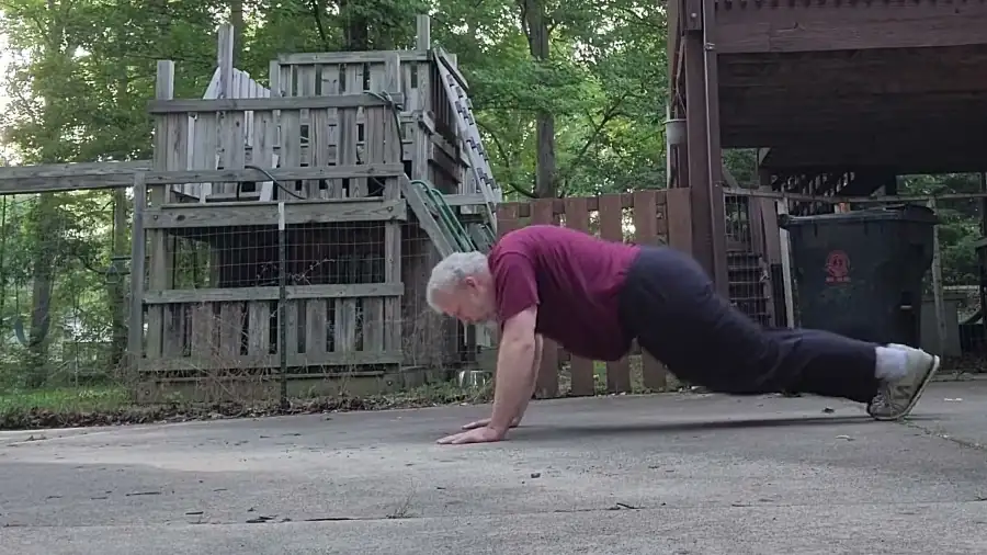 Stuart serving his burpee penalty in 2024