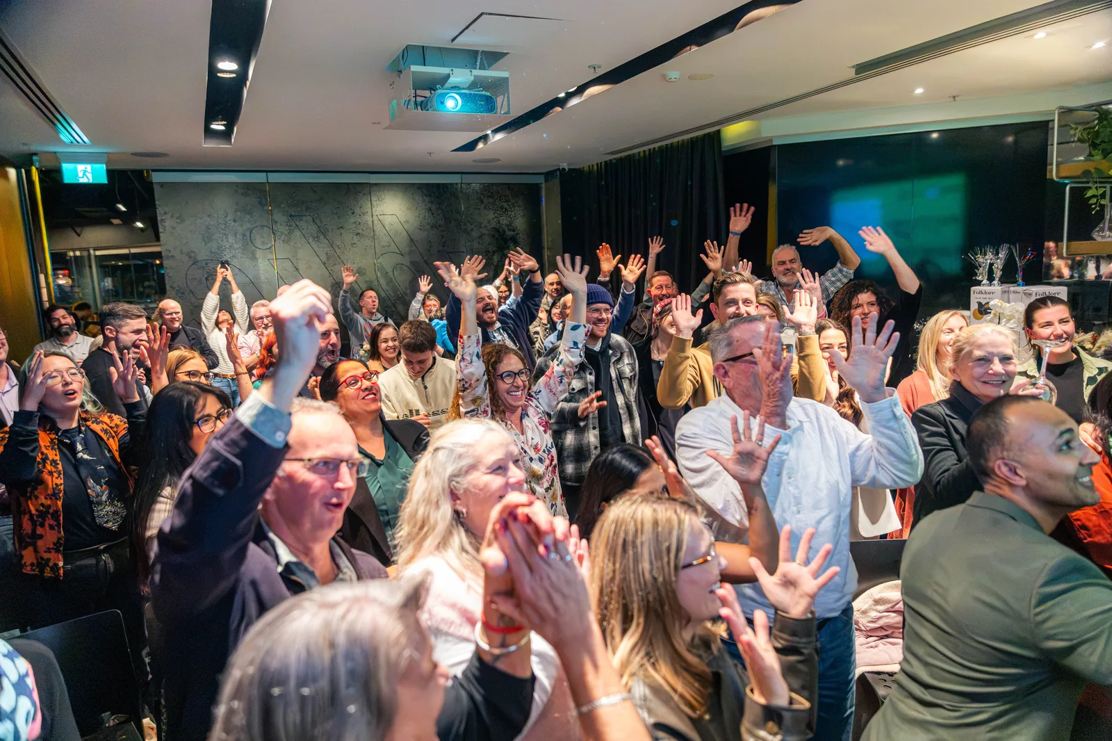 A packed Perth event audience on their feet, captured by Growth Concept Media for recap and promo content. A packed Perth event audience on their feet, captured by Growth Concept Media for recap and promo content.