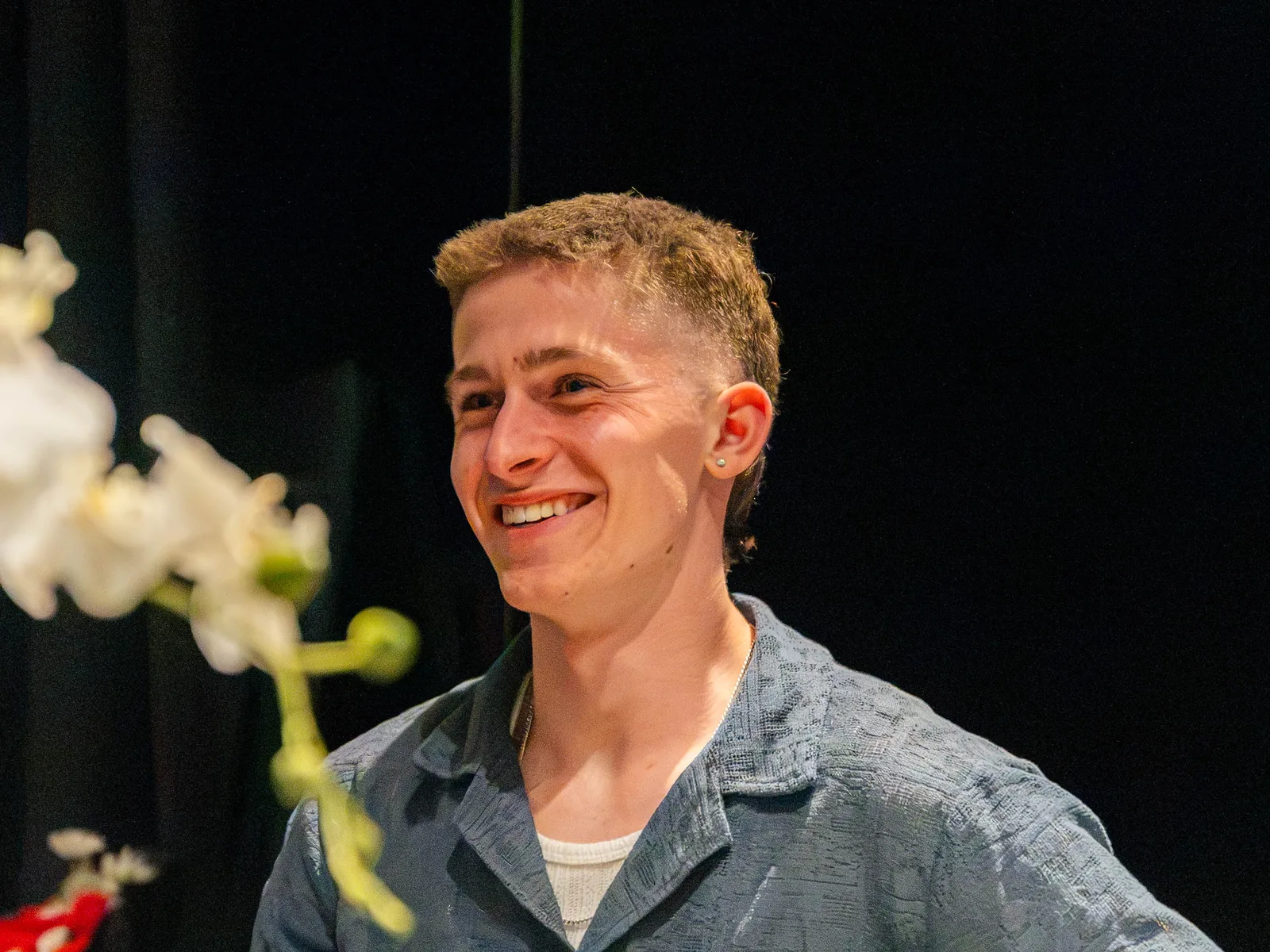 Keoni Upton, founder of Growth Concept Media, smiling at a Perth event. Keoni Upton, founder of Growth Concept Media, smiling at a Perth event.