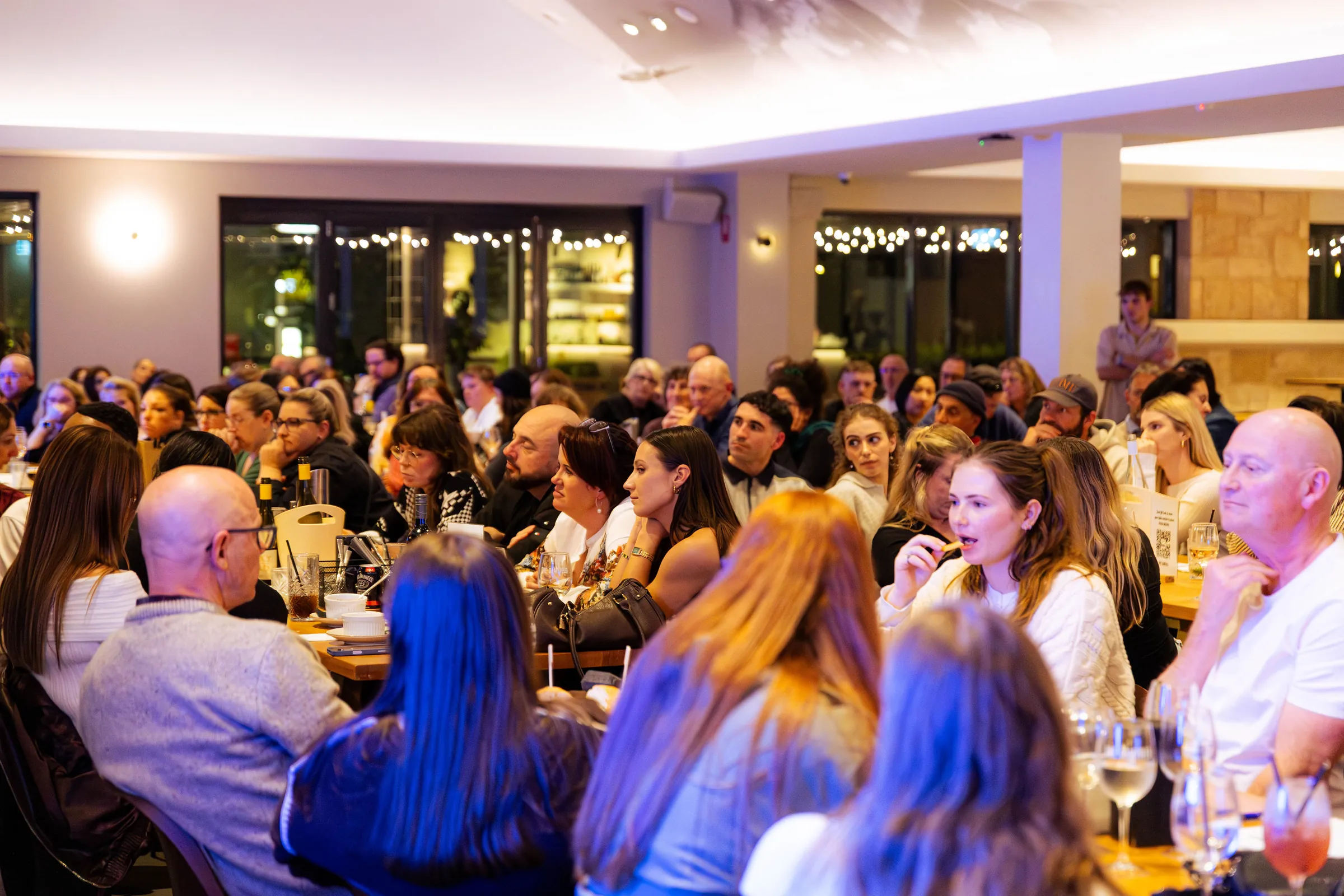 Guests seated at the Armed For Life quiz night at The Hall, The Camfield, Burswood, photographed by Growth Concept Media.