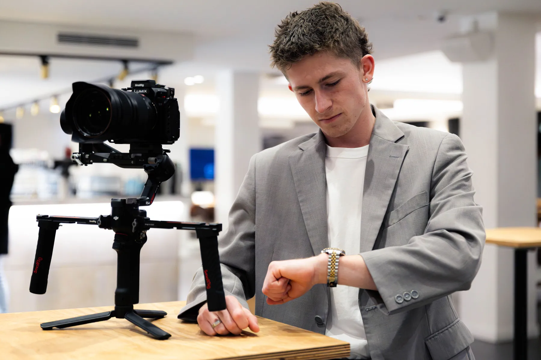 Keoni Upton checking a cinema camera before a Perth shoot.