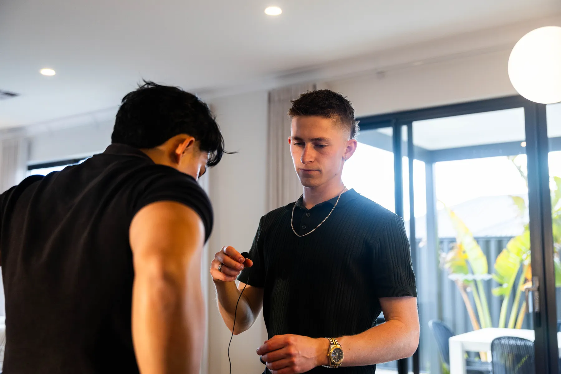 Keoni talking a shot through with a client.