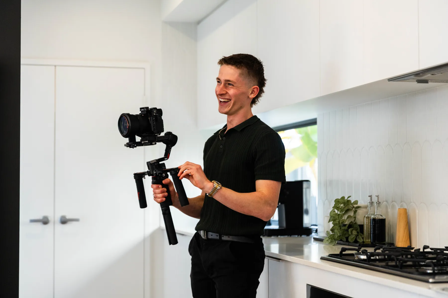 Keoni Upton with a gimbal on a come-to-you videography job in Perth.