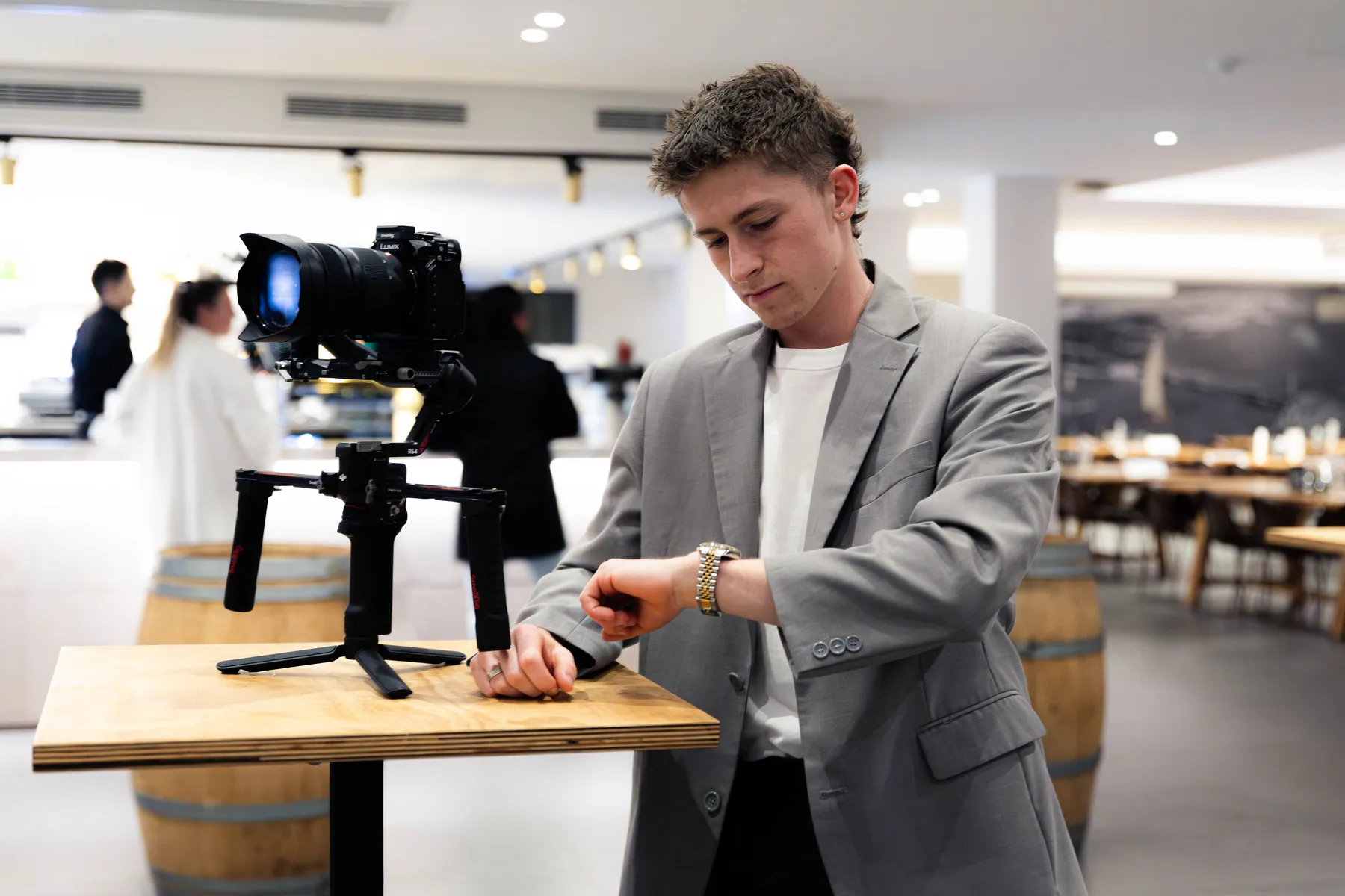 Keoni checking a camera on a gimbal.