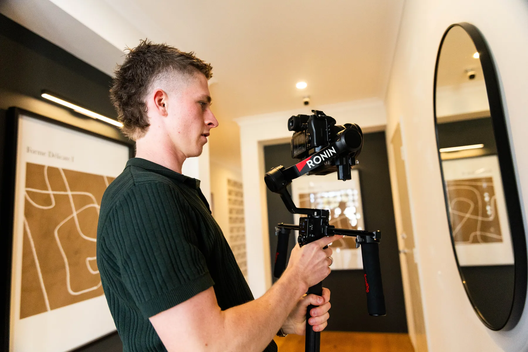 Keoni Upton operating a gimbal on a Perth personal-brand shoot.