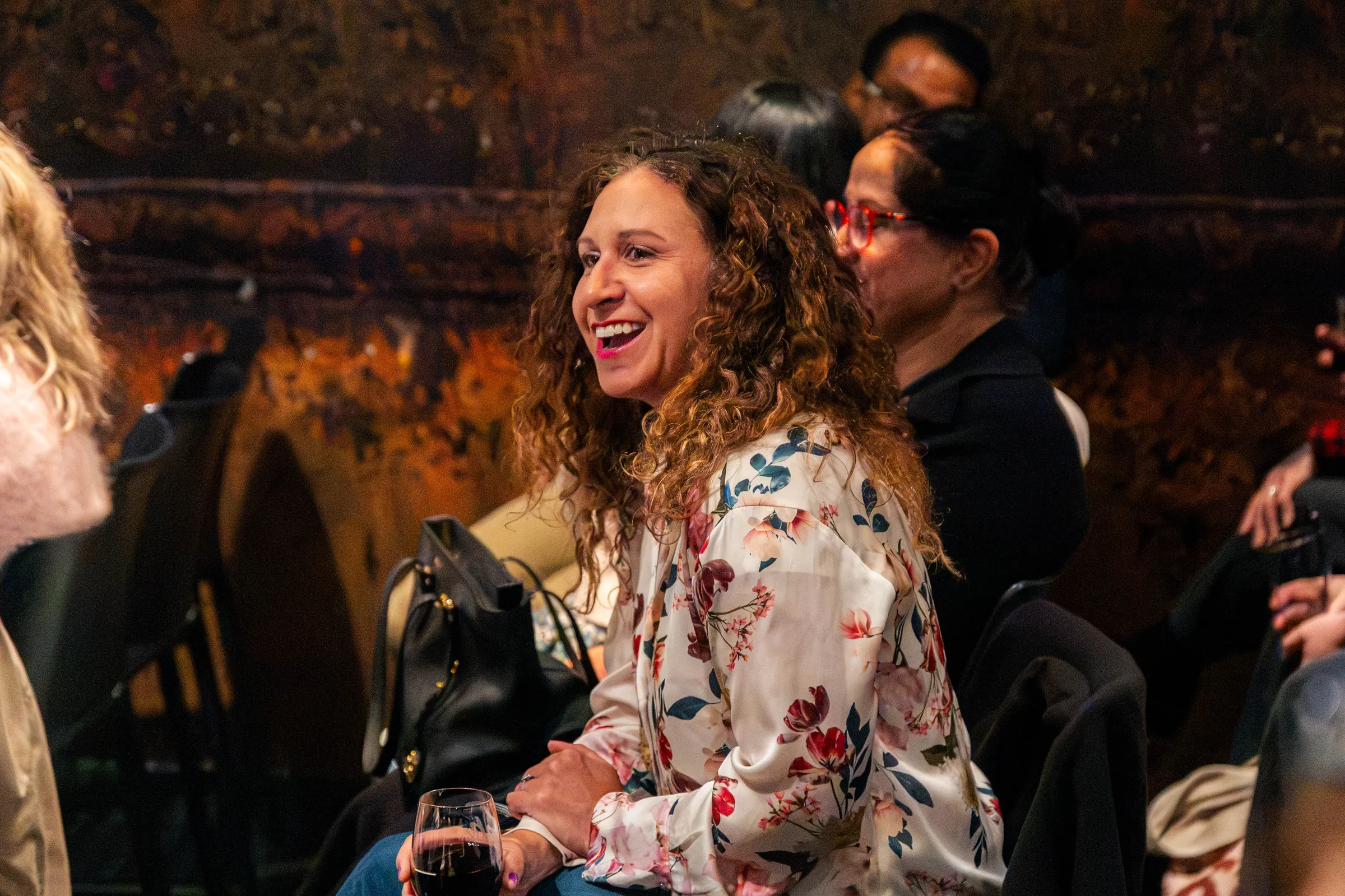 A guest laughing in the crowd at a Perth event, event photography by Growth Concept Media. A guest laughing in the crowd at a Perth event, event photography by Growth Concept Media.
