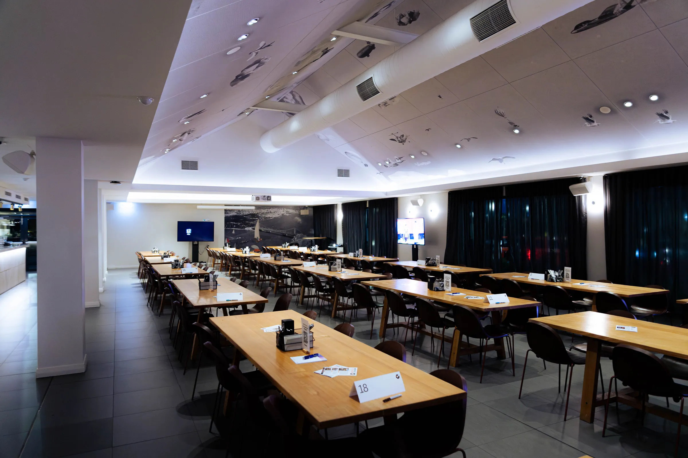 A Perth networking room set with tables before the guests arrive.