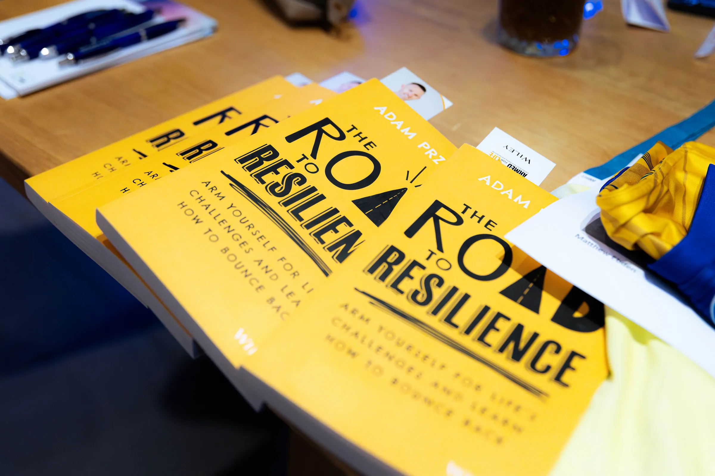 Copies of The Road to Resilience on a table at the Armed For Life quiz night at The Hall, The Camfield, Burswood.