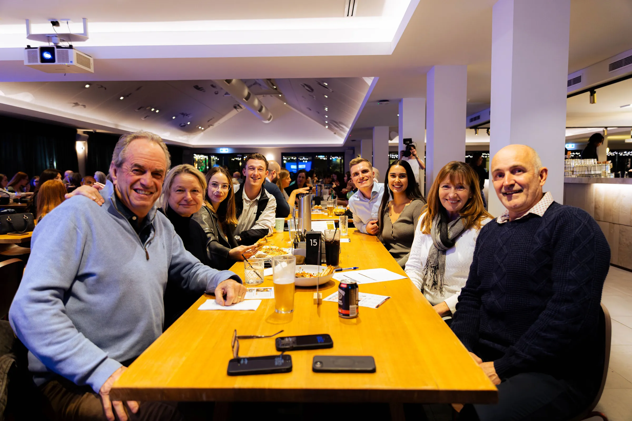 Guests seated along a table at a Perth event, photographed by Growth Concept Media.