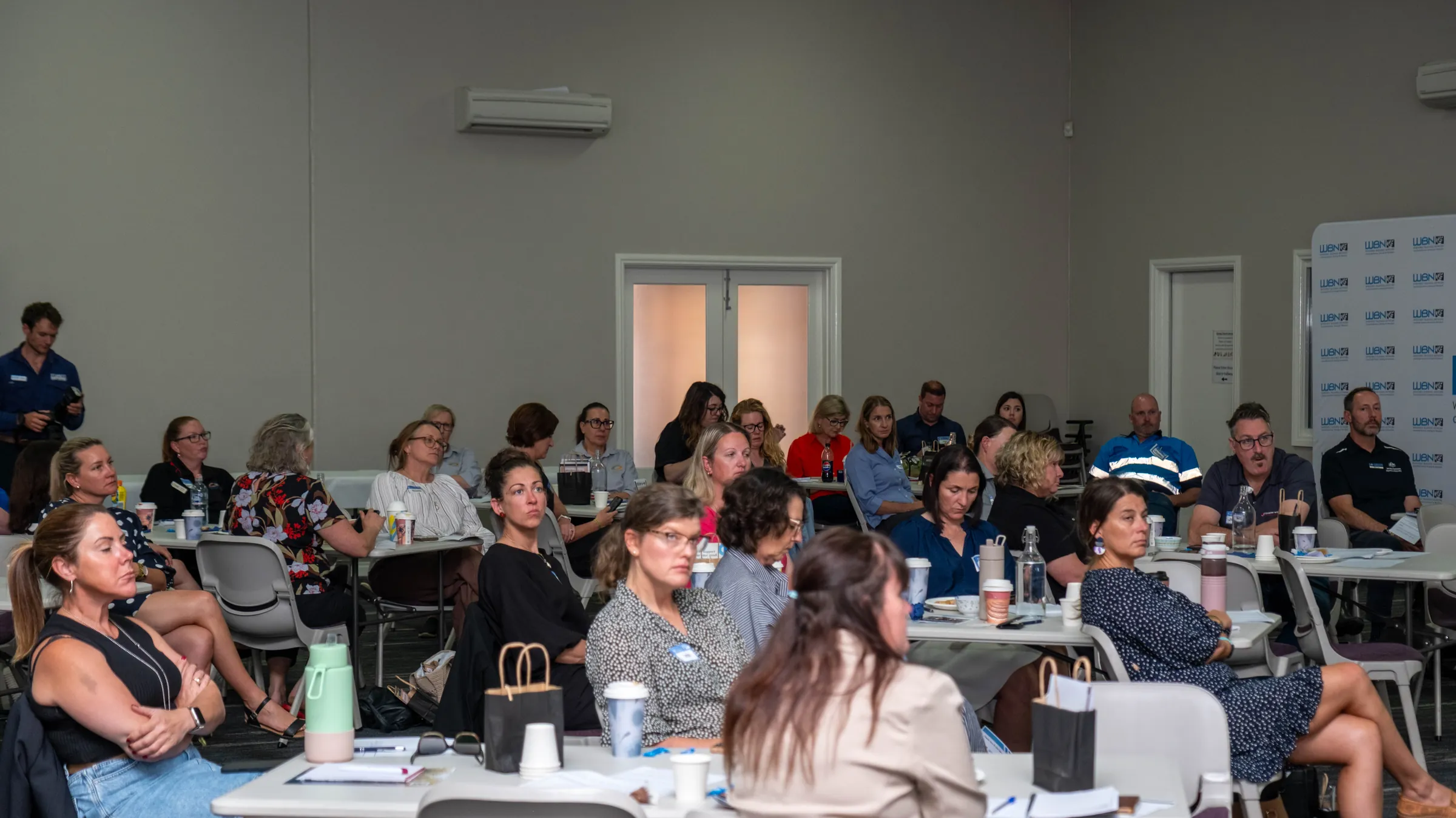 An audience seated at a Perth seminar, photographed by Growth Concept Media.