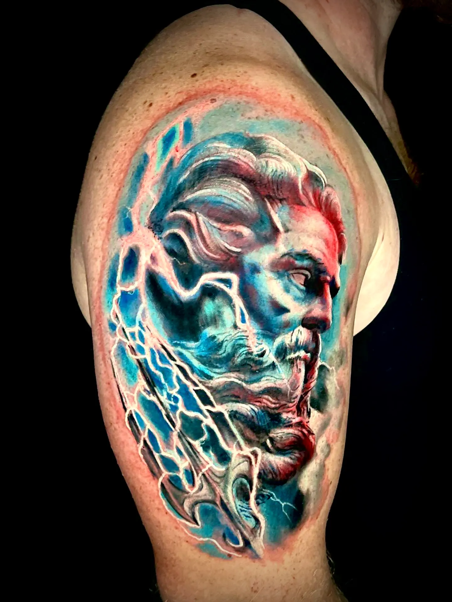 Poseidon color realism portrait tattoo by Chucky Holden in Arlington, Texas