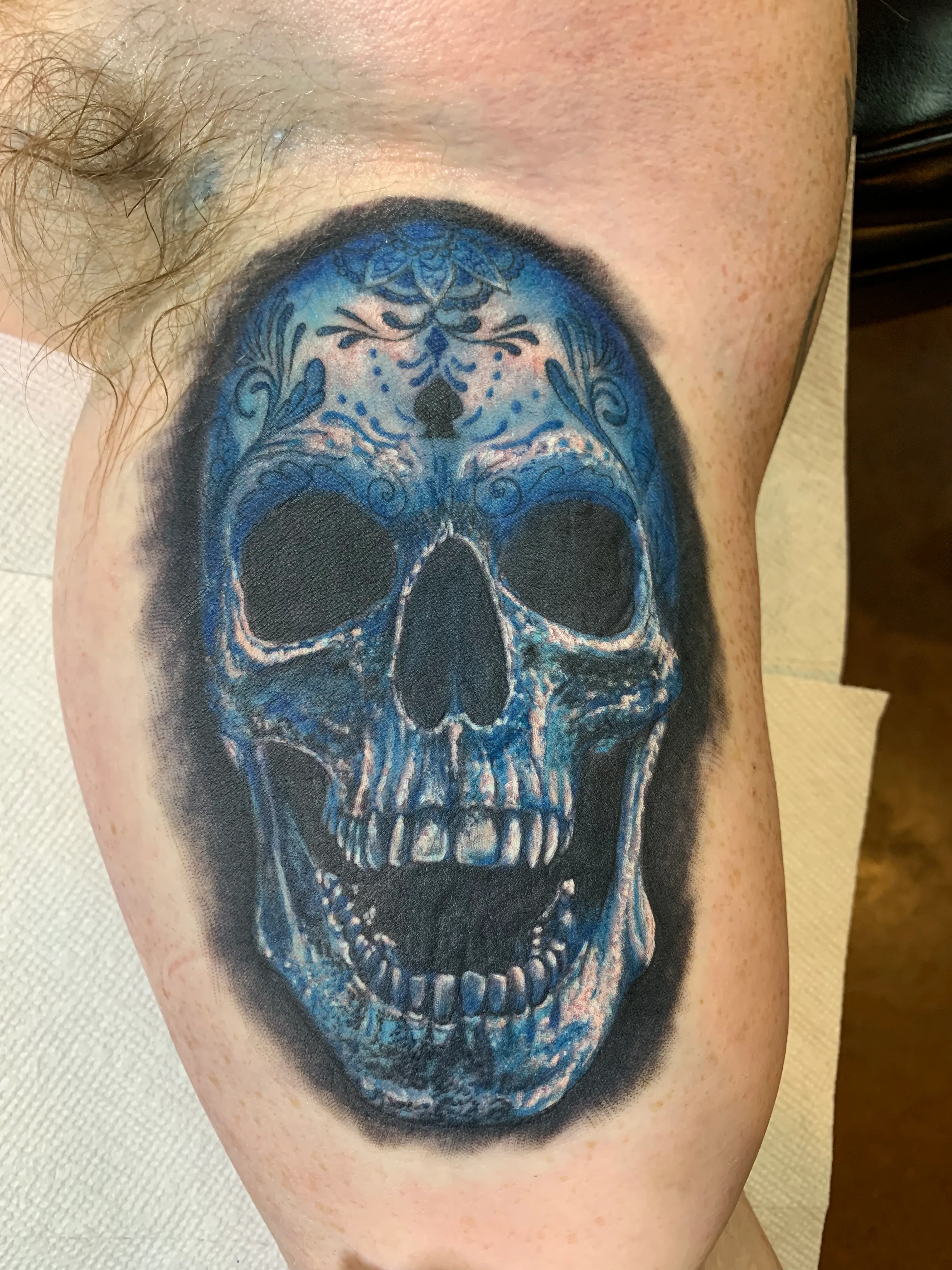 Blue skull realism tattoo by Chucky Holden in Arlington, Texas