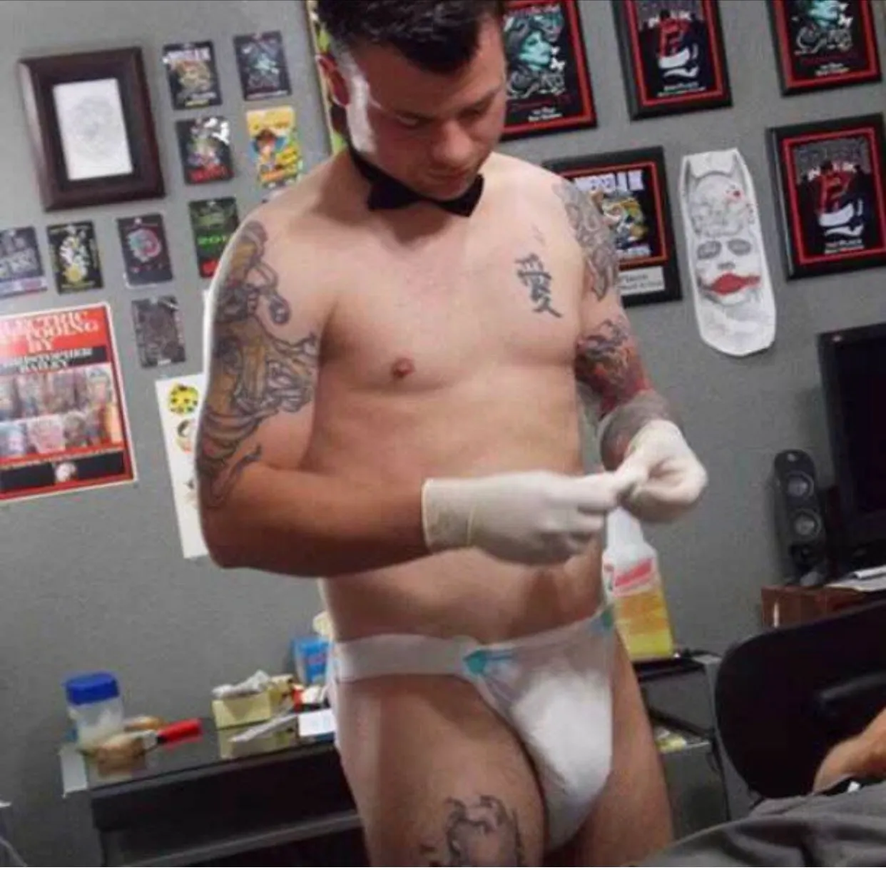 Chucky Holden tattooing during a client session in Arlington, Texas