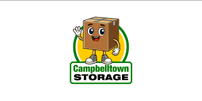 Logo of Campbelltown Storage featuring a smiling brown cardboard box character with eyes, mouth, arms, hands, and legs wearing white gloves and sneakers, waving with one hand, set against an orange and green circular background above the text 'Campbelltown STORAGE'.