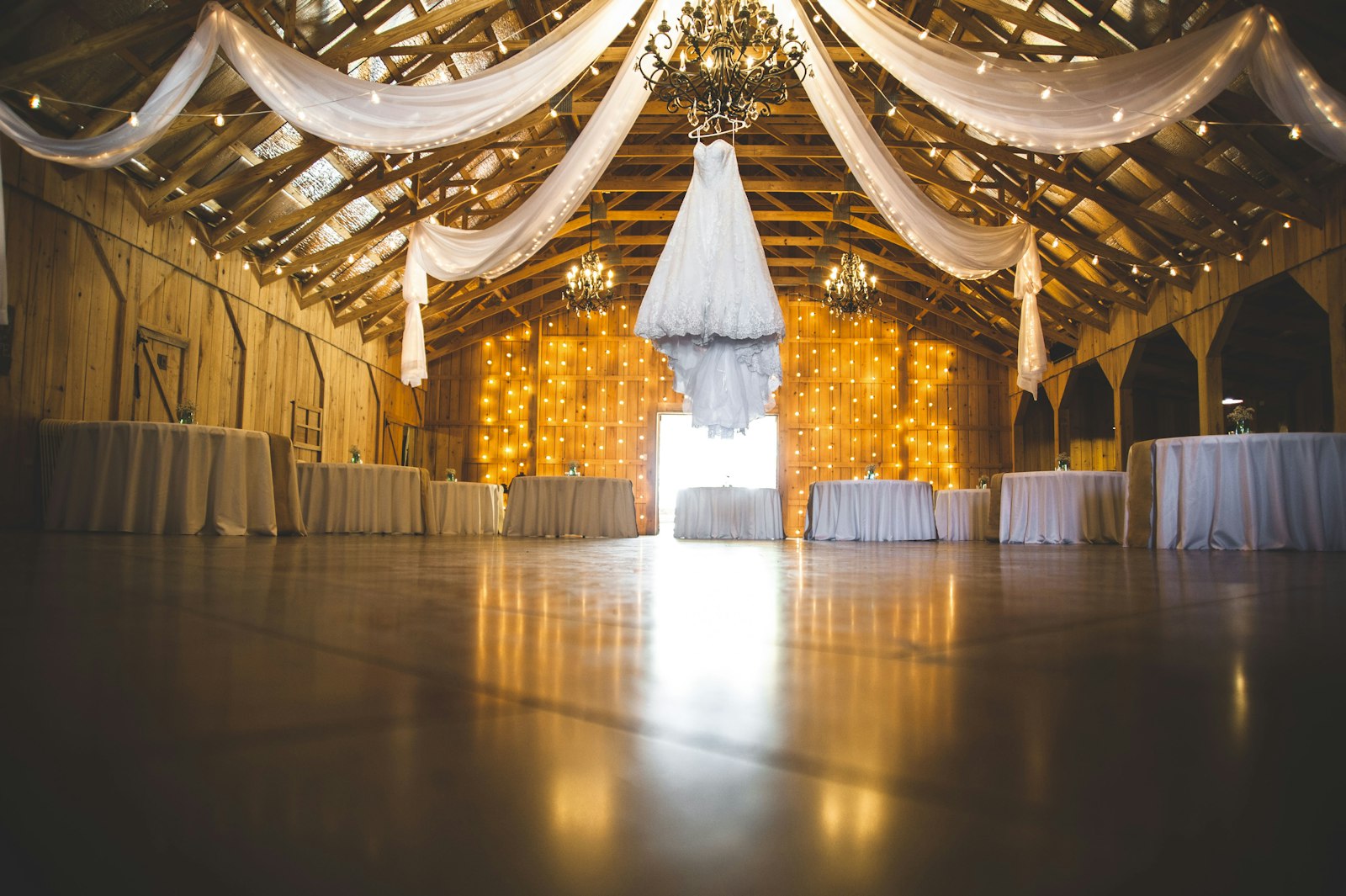 Wedding reception tables set for dinner