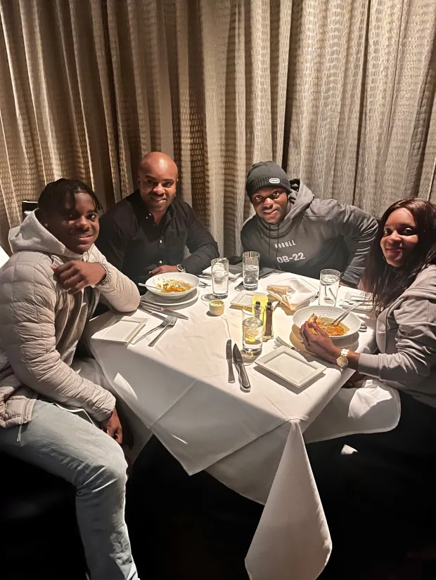 Lake Elsinore resident Clark Phillips, second from left, is seen at dinner with his family last year in Indianapolis. From left are sons Bryce, Clark and wife Lakeisha Phillips. Clark Phillips, 50, is competing in a national fitness contest. (Courtesy of Clark Phillips)