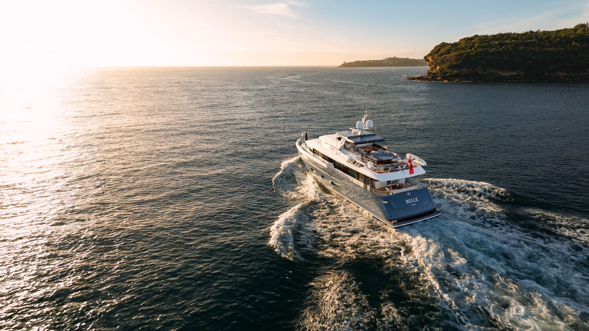 Belle's yacht cruising to the sunset