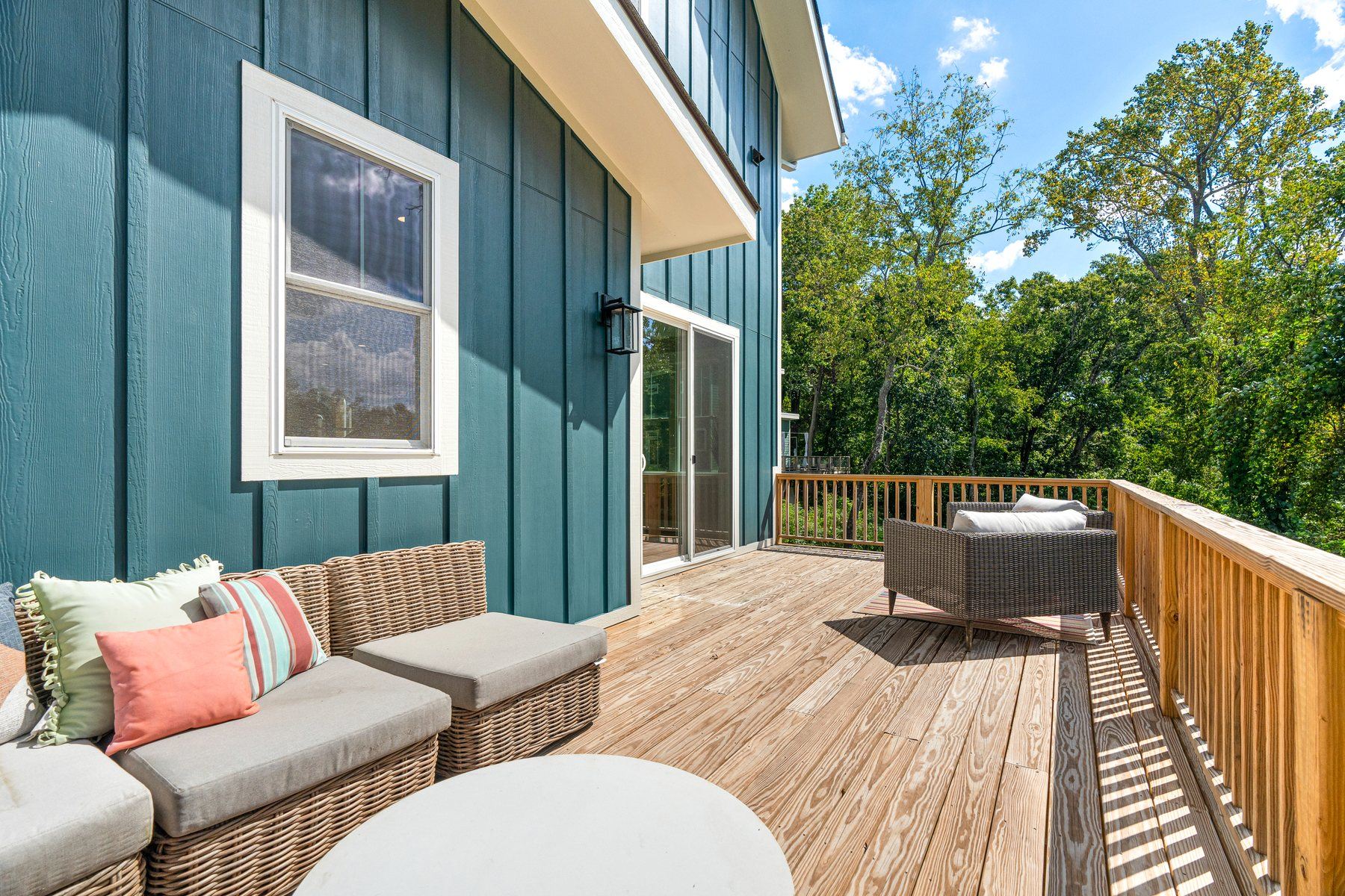 Board-and-batten siding and deck at 112 Alma Lane
