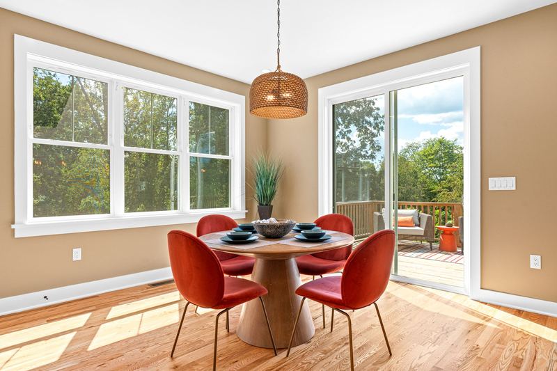 Dining area with a wall of windows