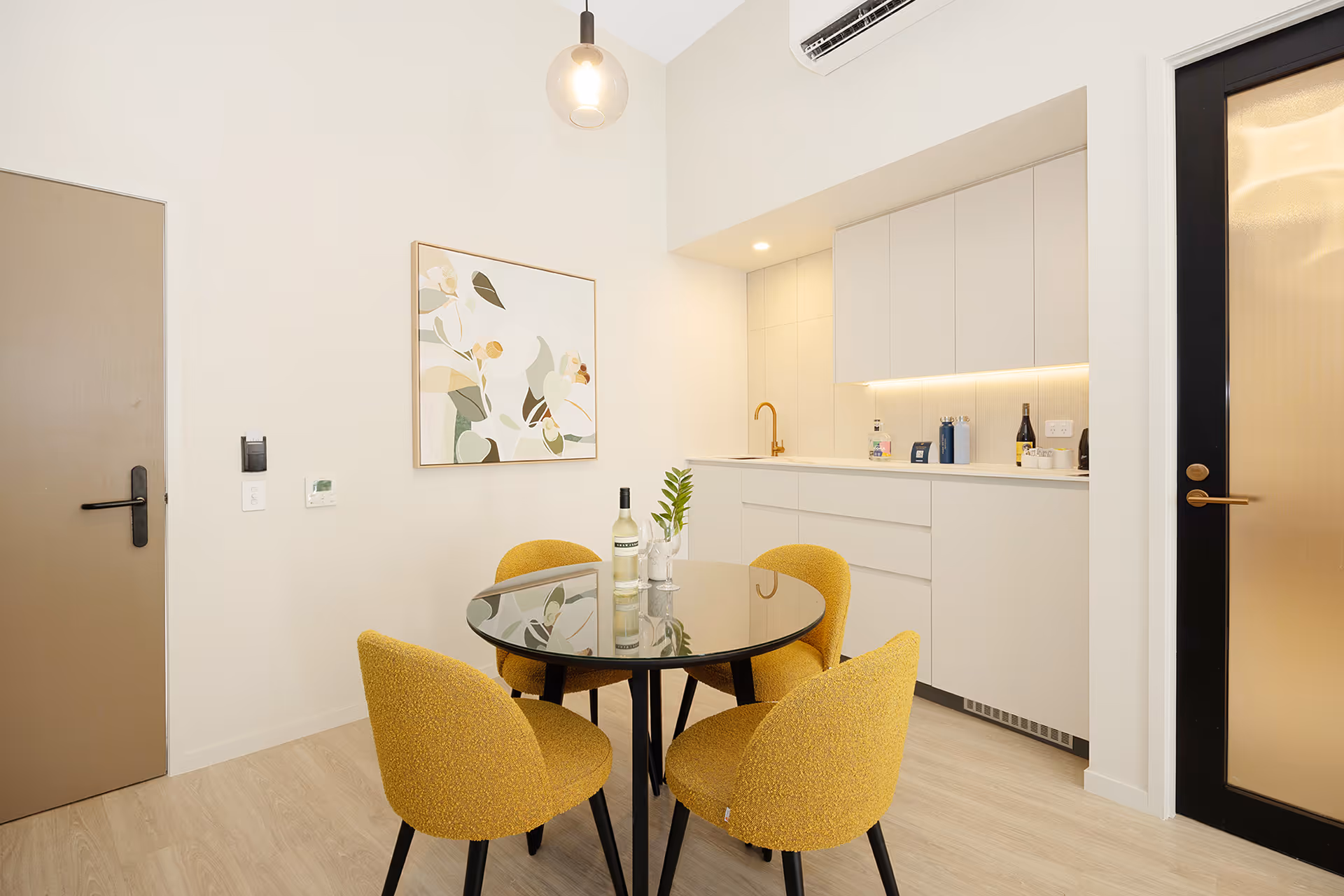 The kitchenette and dining setting in the Executive Suite.