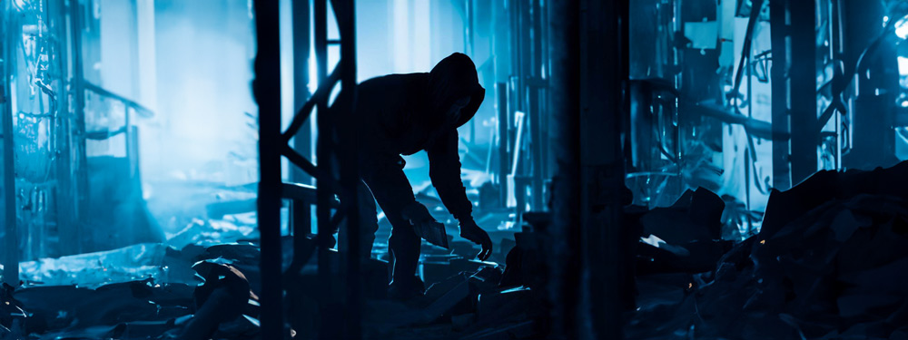 thief stealing from construction site at night