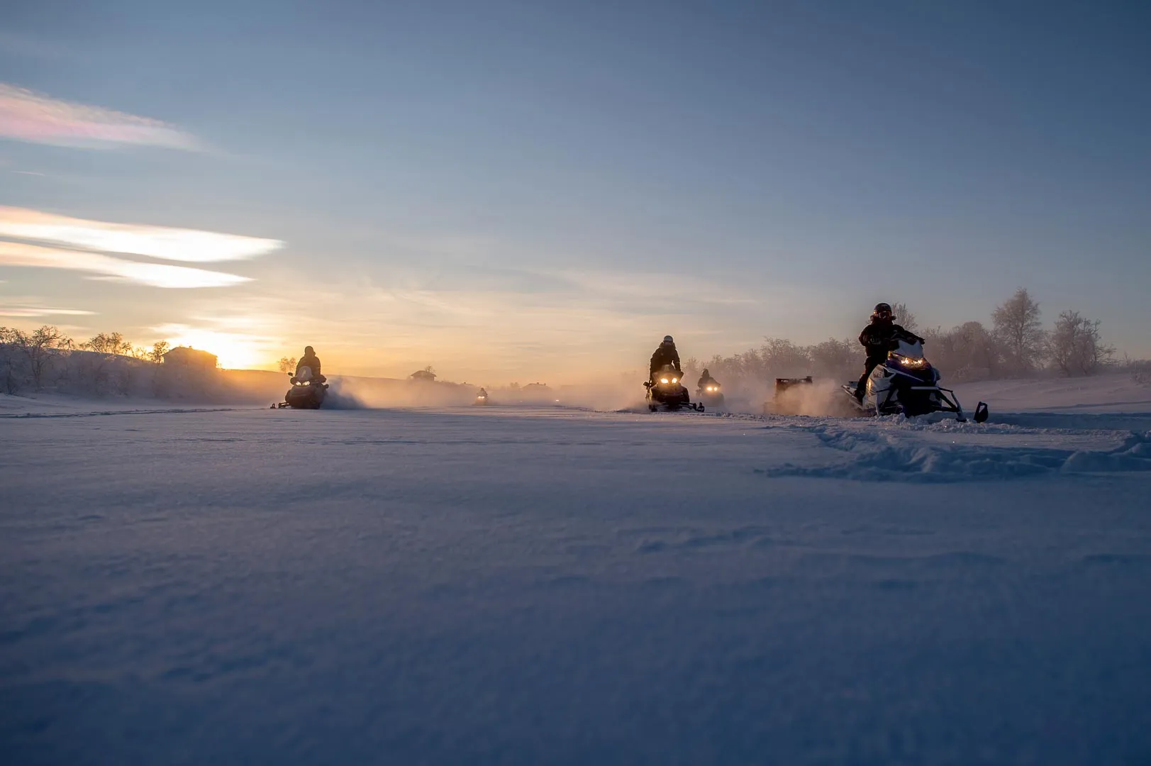 Snowmobile tour across the Finnmark Plateau