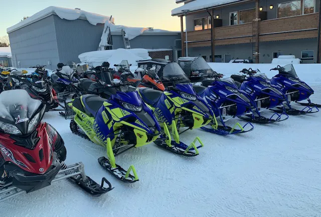 Snowmobiles ready for departure
