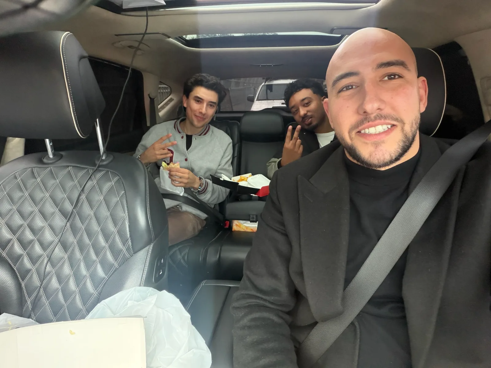 Music producer Nico Baran and Producer Circle founder Benny in the Genesis GV80 cabin in Sydney