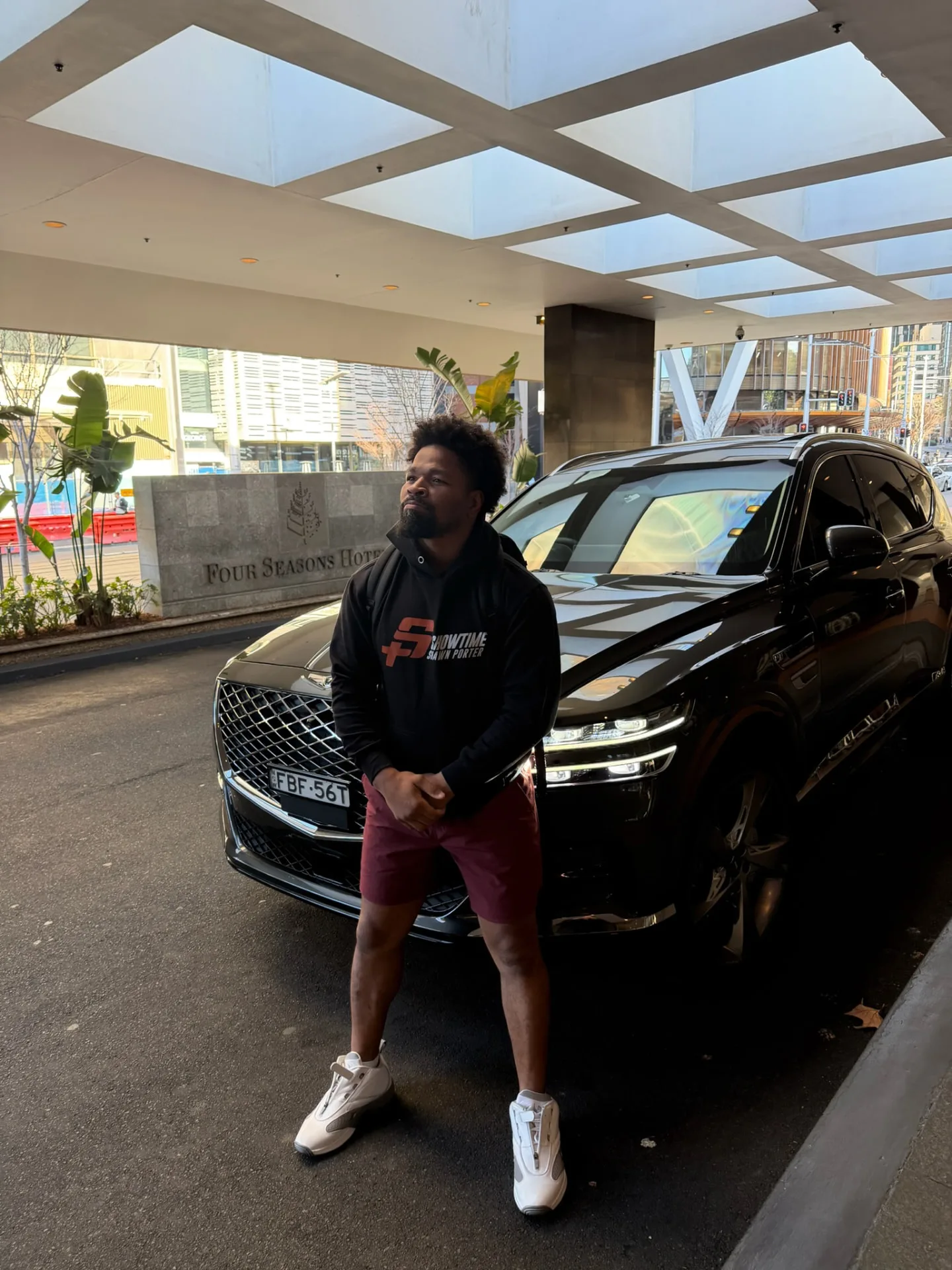 Shawn "Showtime" Porter with our Genesis GV80 Luxury Pack outside his Sydney CBD hotel