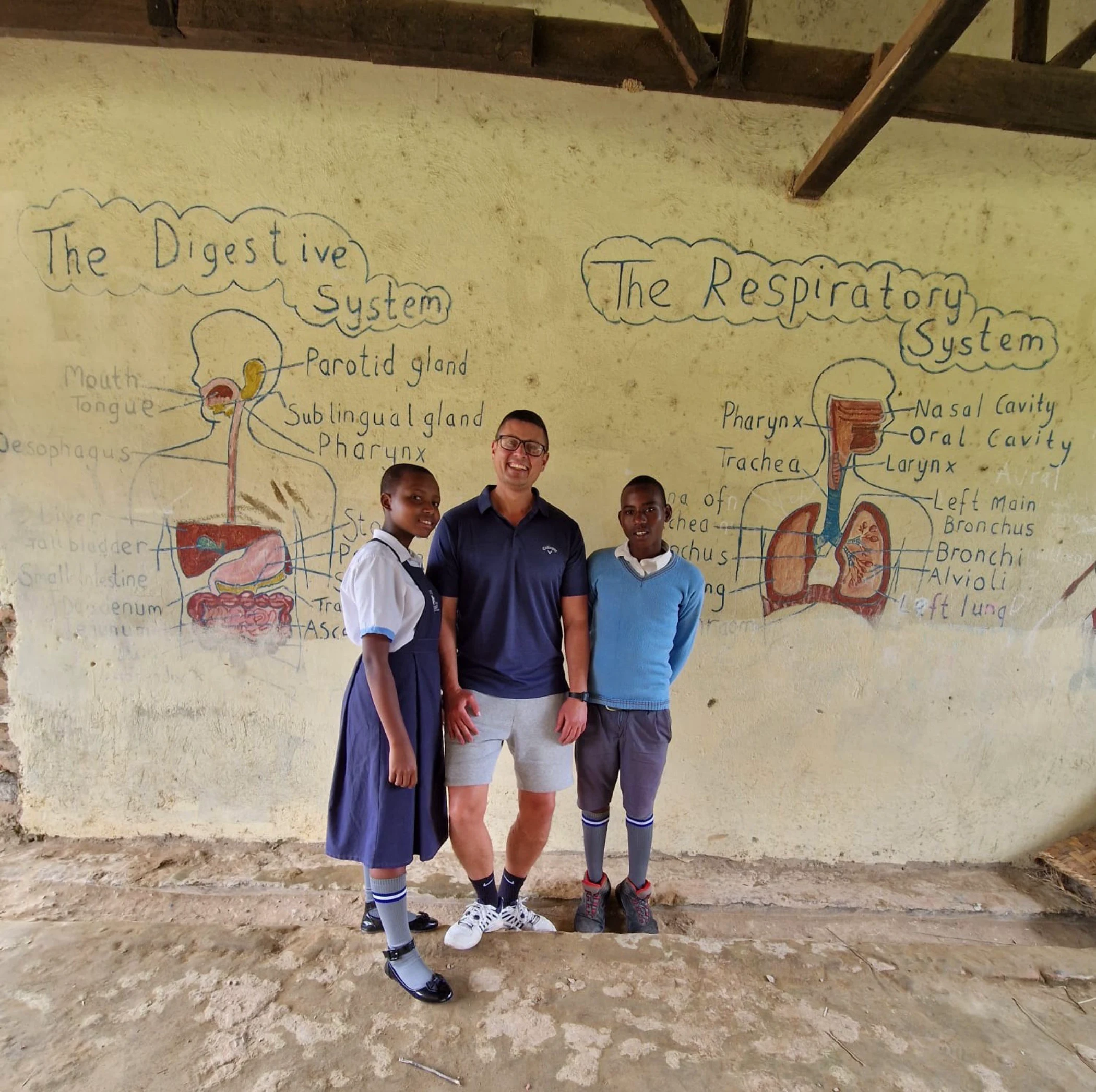 Alan Hepworth with pupils at the school Tutoring Heroes supports in rural Uganda